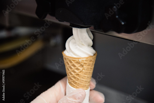 Industrial preparation of creamy ice cream on the kitchen. Restaurant or cafe cuisine