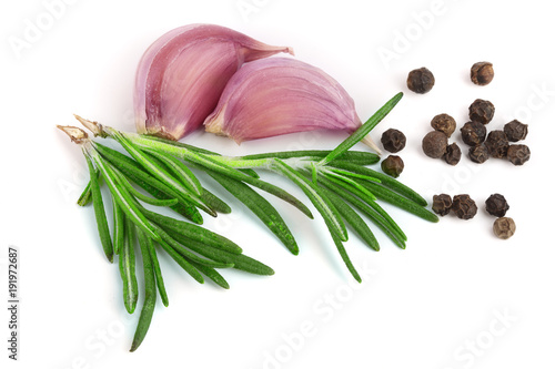 garlic with rosemary and peppercorn isolated on white background. Top view