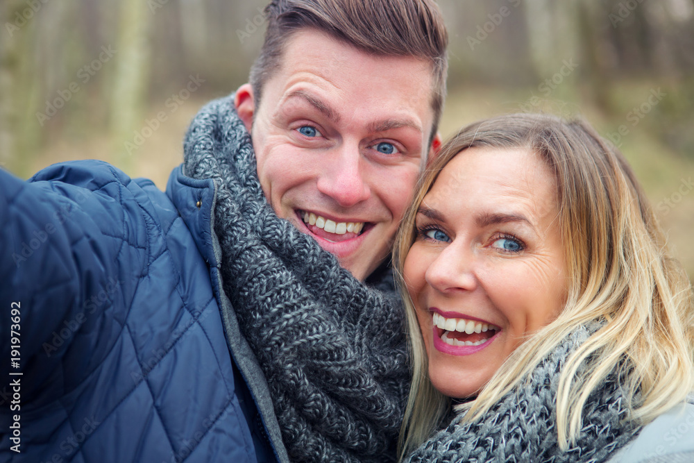 Fototapeta premium selfie of young couple outdoors in the cold