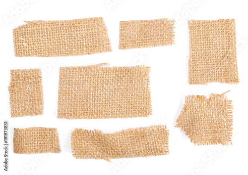Blank textile, jute, linen tags, pieces isolated on white background