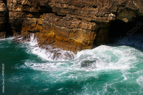 Sea waves hitting rock cliffs at Boca do Inferno, Cascais, Portugal