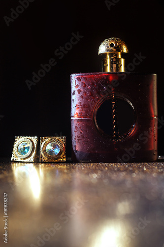 male red perfume with golden cuff
