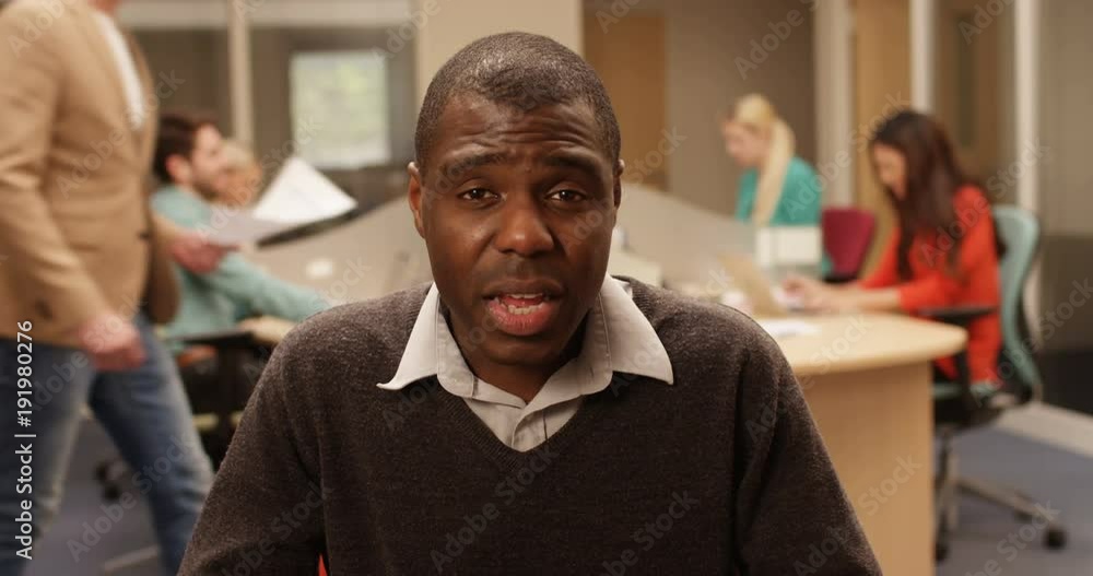 4K Businessman having a serious conversation via video call in the office 4K Businessman having a serious conversation via video call in the office