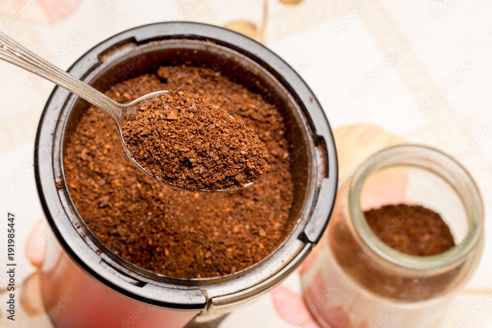 coffee, ground in a coffee grinder, be filled upinto a jar with a spoon coffee, ground in a coffee grinder, be filled upinto a jar with a spoon