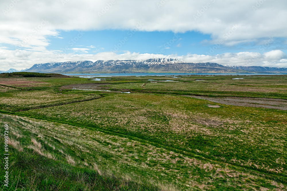 Meadows and mountains in Laufas near Akureyri, Iceland
