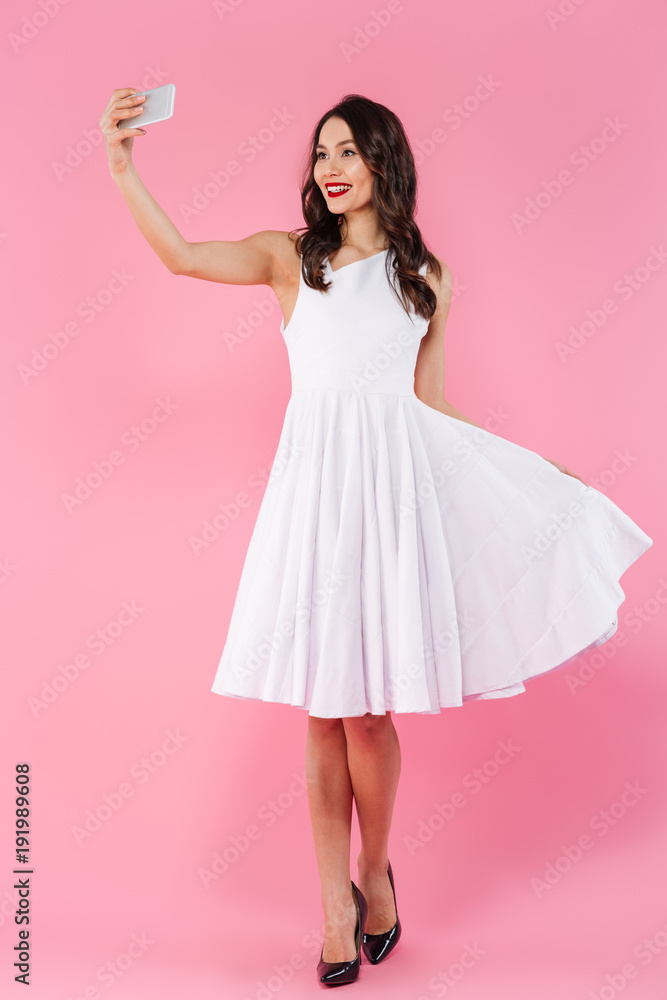 Full length portrait of a beautiful young asian woman Full length portrait of a beautiful young asian woman