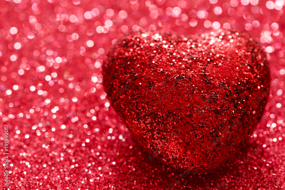 Brilliant red heart on a red shiny background. Macro. Valentine's Day. Postcard. 14 February. Space for text Brilliant red heart on a red shiny background. Macro. Valentine's Day. Postcard. 14 February. Space for text