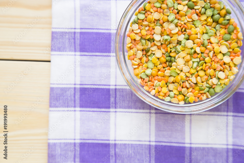 Set of raw ingredients for Italian cooking on a table. Beans, papper, olive oil. Set of healthy food products. Closeup Set of raw ingredients for Italian cooking on a table. Beans, papper, olive oil. Set of healthy food products. Closeup