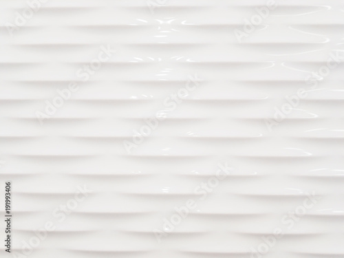 Vászonkép Abstract background of white smooth and sleek wall with embossed pattern