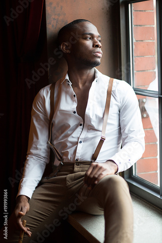Black male model at window