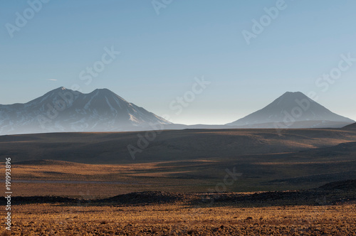 Landscape with mountains at dawn from road to Paso Sico, Atacama Desert, Chile photo