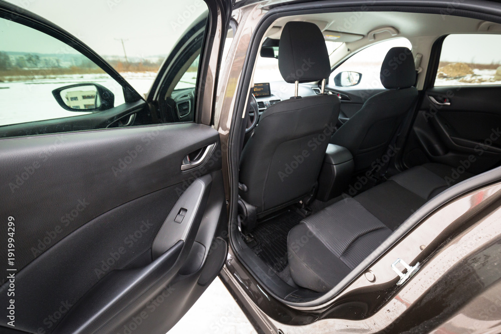 Black car interior with back seats
