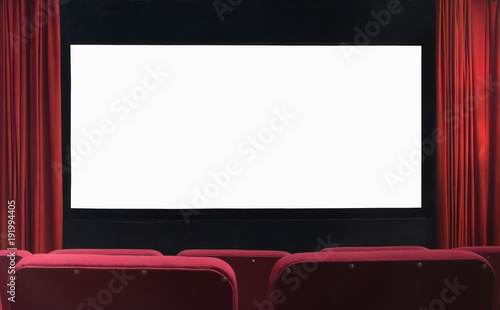 Blank movie cinema screen with red curtains and empty seats