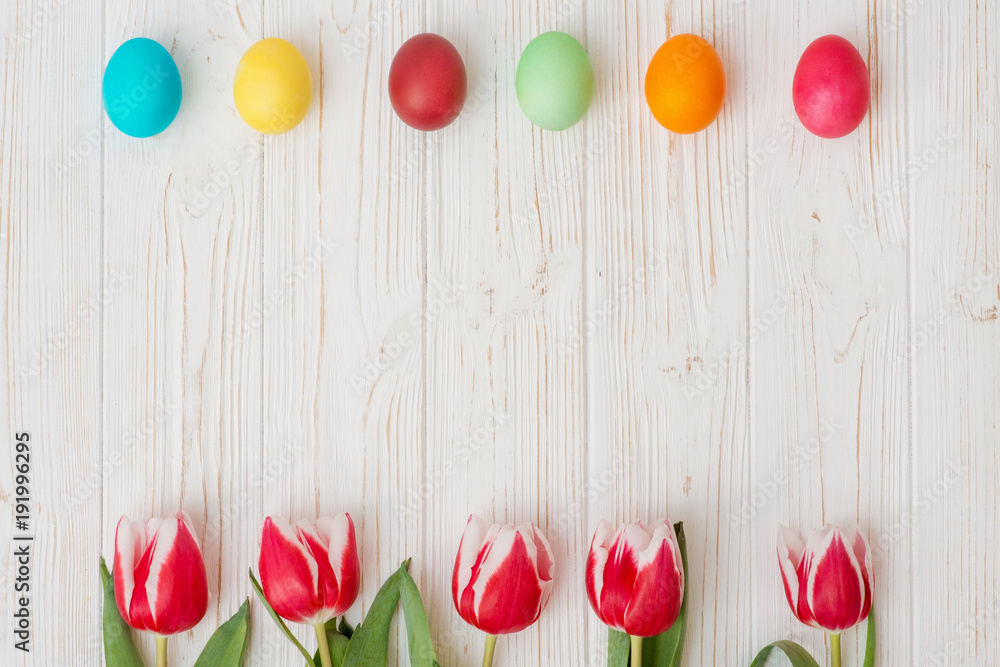 Easter eggs and pink tulips