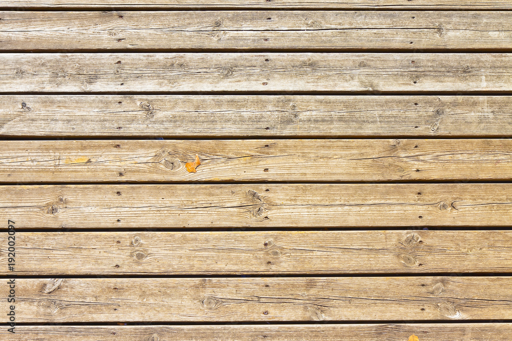 Old wooden floor slats for outdoor use stuck with metal nails Old wooden floor slats for outdoor use stuck with metal nails