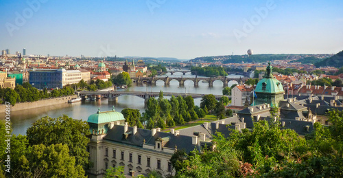 Panorama view of Prague skyline with Charles bridge and Vltava river in the late afternoon summer, Czech republic