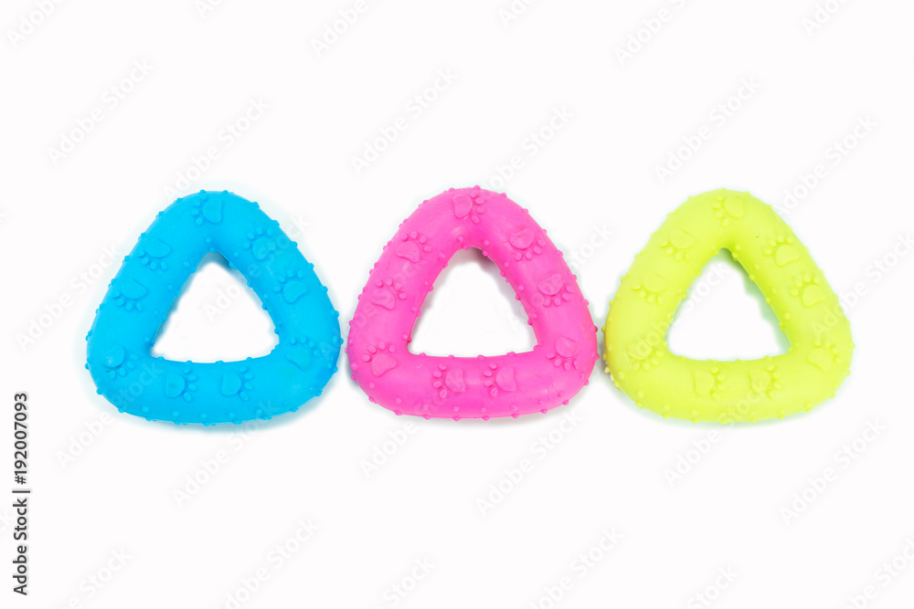 Fototapeta premium Pet supplies about rubber toys for pet on isolated white. Concept rubber toys for dog or cat.