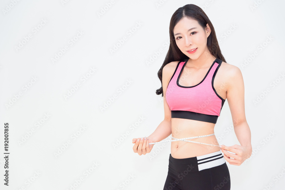 Diet fitness exercise sport sexy body asian woman with measuring tape, dieting, fitness, sport, exercise concept isolated on white background. Dieting and fitness make the good sexy body woman Diet fitness exercise sport sexy body asian woman with measuring tape, dieting, fitness, sport, exercise concept isolated on white background. Dieting and fitness make the good sexy body woman