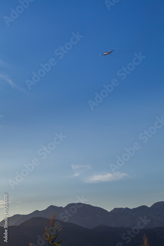 Take off the aircraft from the airfield Tivat flying over me. Montenegro. 
