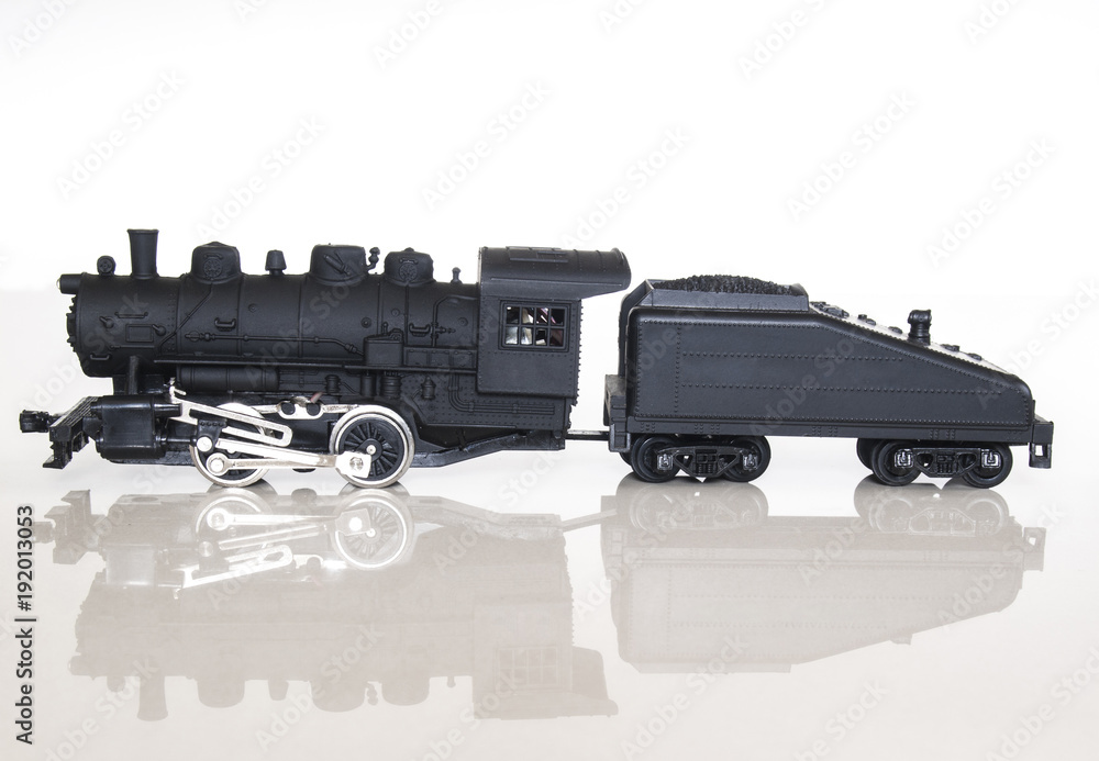 Steam locomotive model train / Isolated white