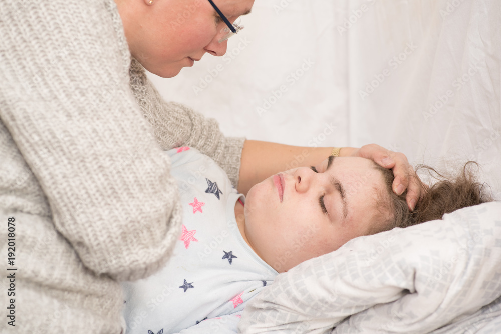 Fotografie A child with epilepsy during a seizure