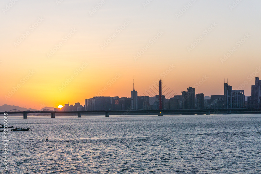 panoramic cityscape during sunset