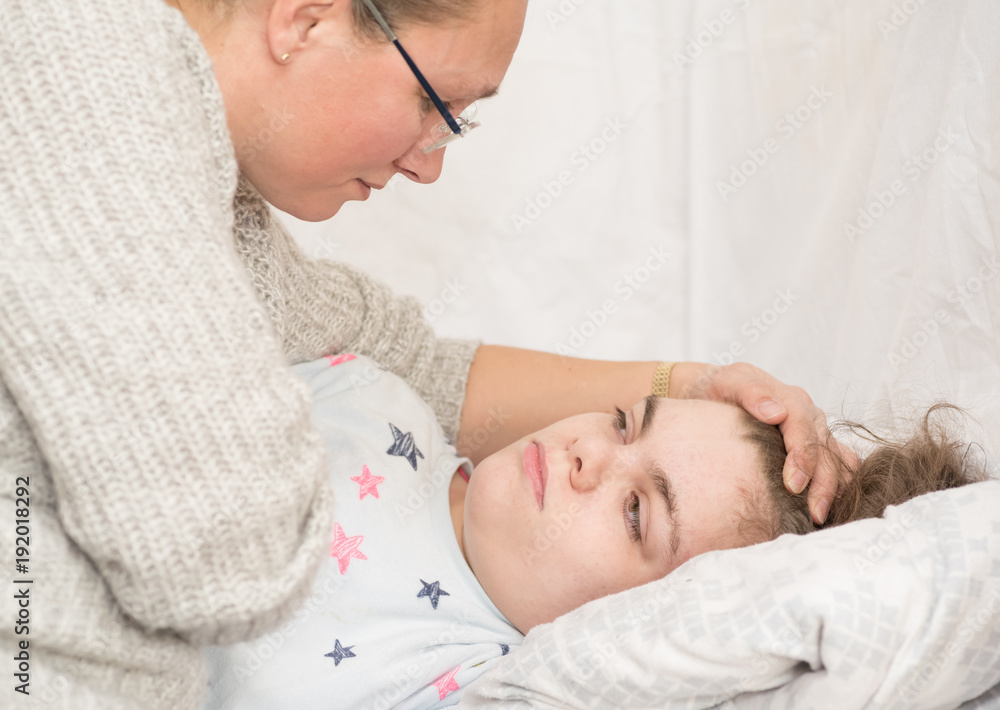 A child with epilepsy during a seizure A child with epilepsy during a seizure