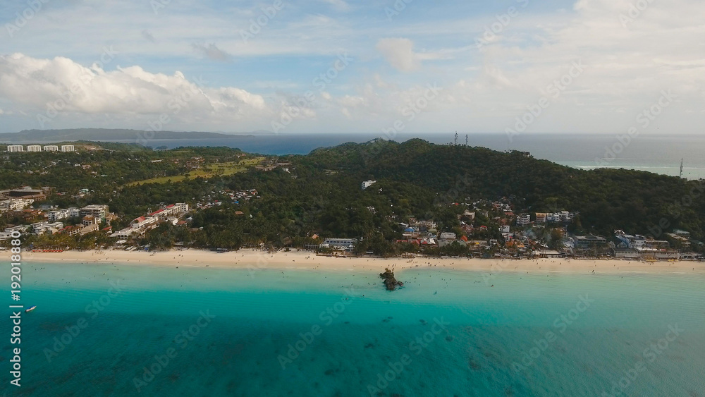 Aerial view of beautiful tropical island with white sand beach, Boracay, hotels and tourists. Tropical lagoon with turquoise water and white sand. Beautiful sky, sea, beach, resort. Seascape: Ocean