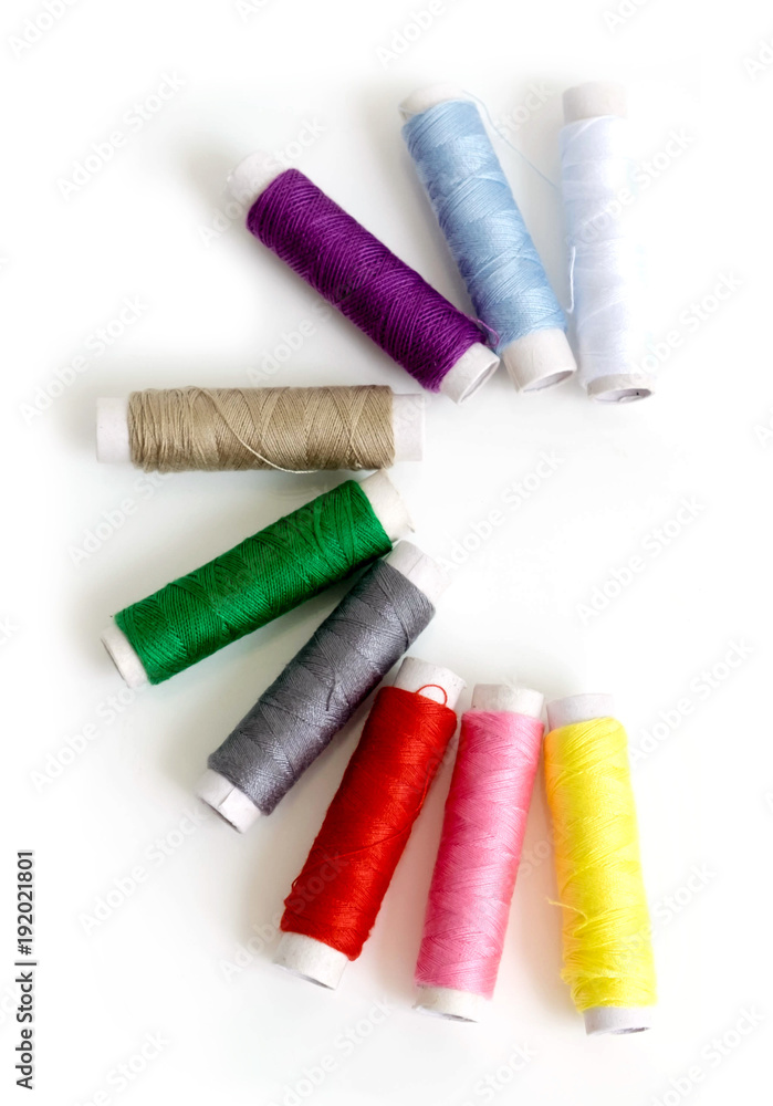 Small multicolor sewing threads row align half circle shape for quick repair clothes Small multicolor sewing threads row align half circle shape for quick repair clothes