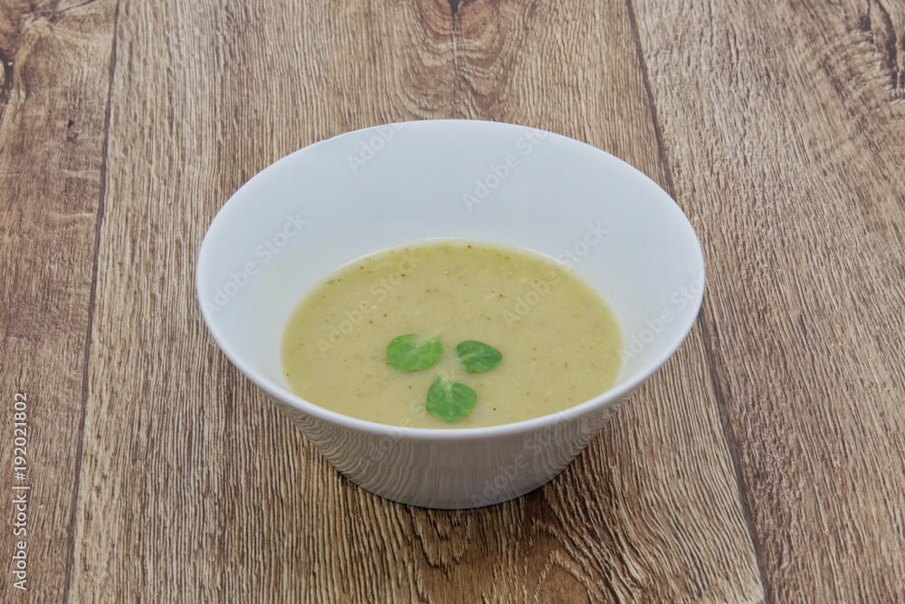 Broccoli cream soup on a table Broccoli cream soup on a table