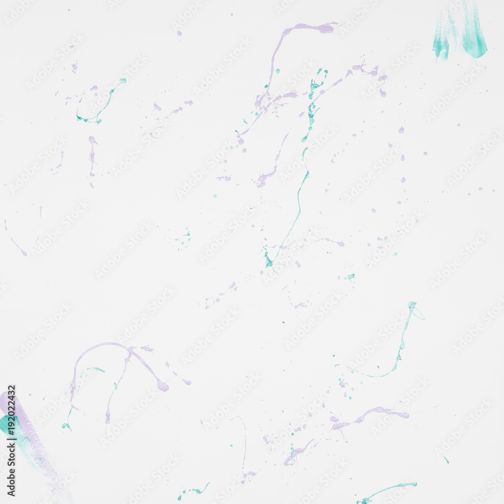 Naklejka premium top view of paper with paint splash