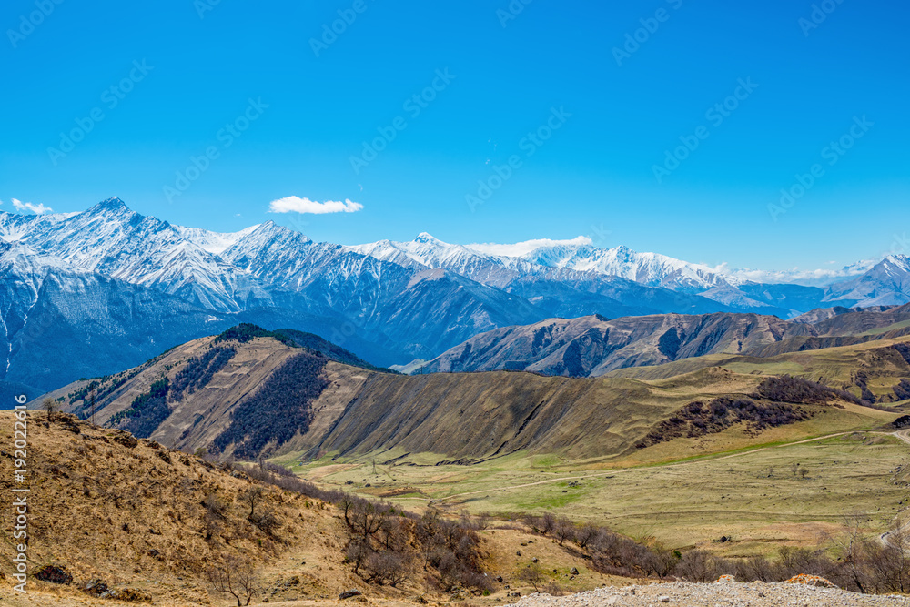 beautiful landscape with snow covered of Caucasus mountain peaks, Republic Ingushetia, Russia