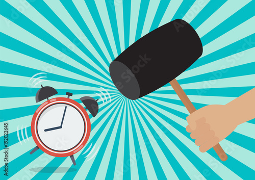 Hand handle a hammer to destroy the alarm clock