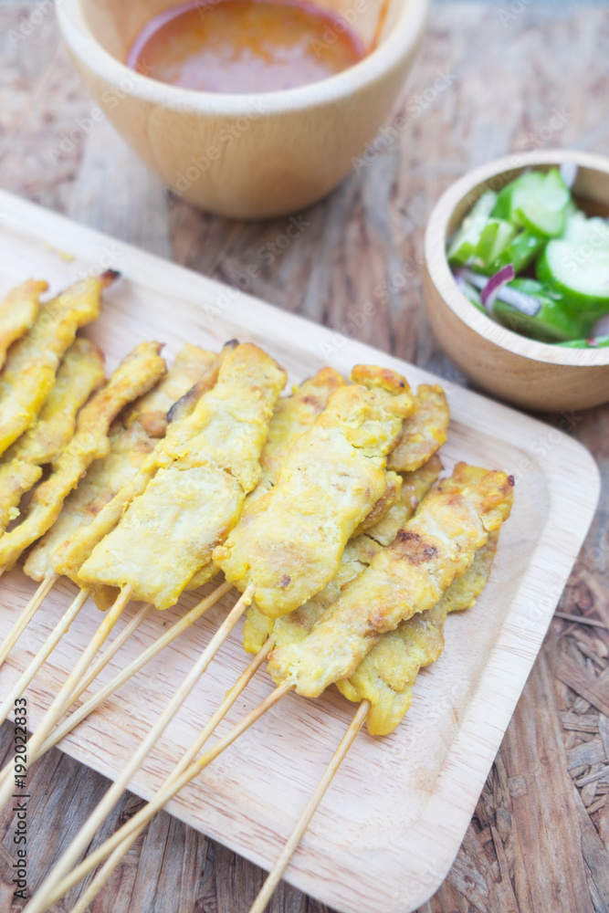 Pork satay on skewers with peanut sauce Pork satay on skewers with peanut sauce