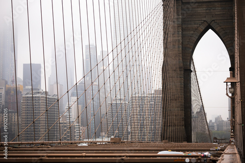 Views of a bridge on a foggy morning photo