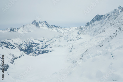 View on the peak of the biggest glacier of jungfrau. Bernese Oberland, Switzerland. Swiss Alps
