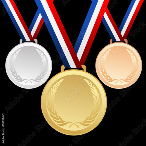 Set of gold, silver and bronze medals with ribbons