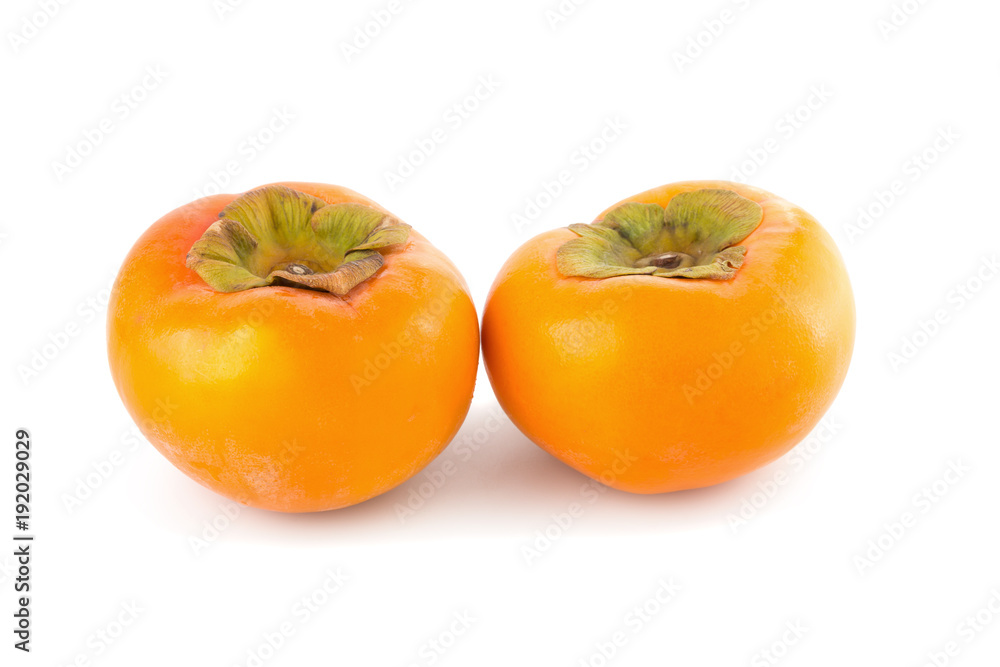 fresh ripe persimmons isolated on white background fresh ripe persimmons isolated on white background