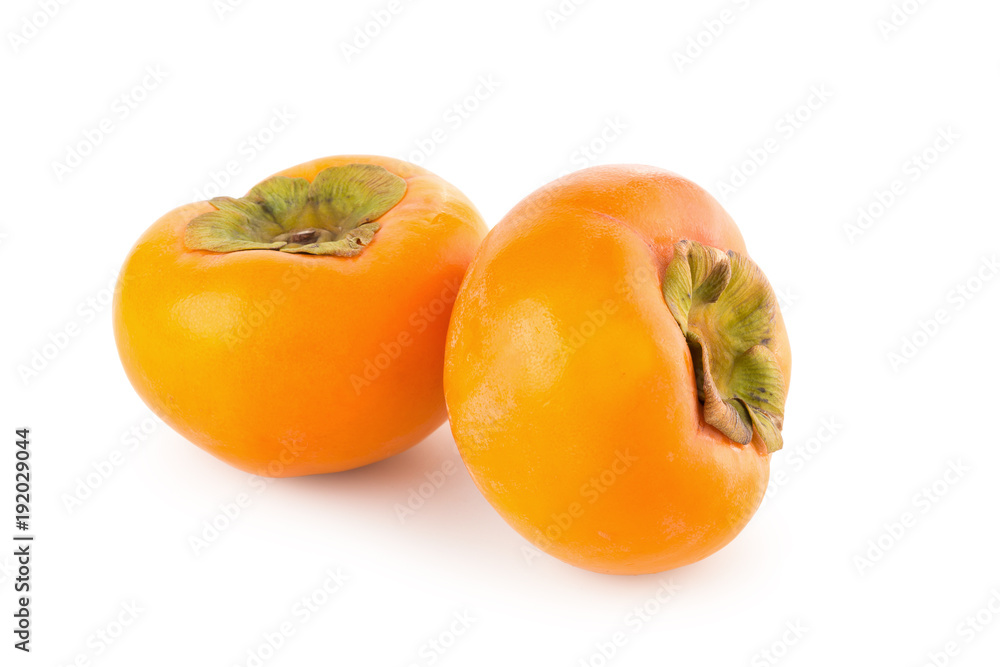 fresh ripe persimmons isolated on white background fresh ripe persimmons isolated on white background