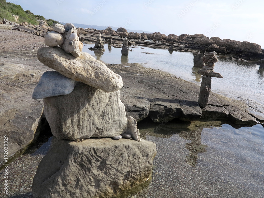 stones balanced on the beach, Rhodes, Greece stones balanced on the beach, Rhodes, Greece