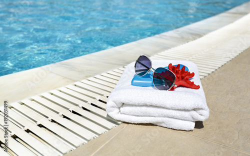 beautiful aura over the pool and a bath towel