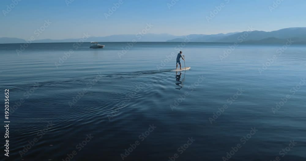 4k Breathtaking view of lone stand up paddle boarder on Lake Tahoe, 4k Breathtaking view of lone stand up paddle boarder on Lake Tahoe,
