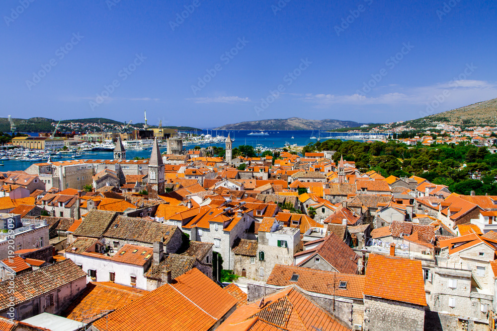 Houses with orange roofs, the Adriatic Sea and yachts in Croatia