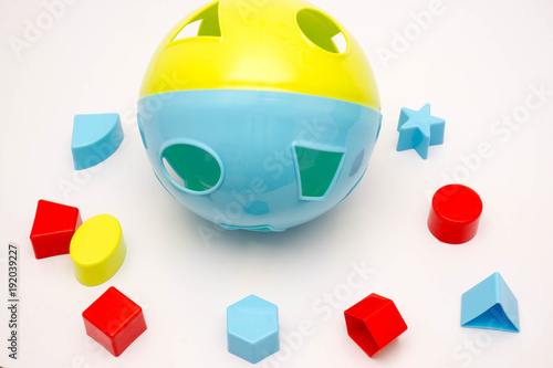 shape sorting ball on white background photo