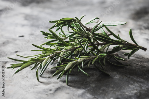 Rosemary on rustic background