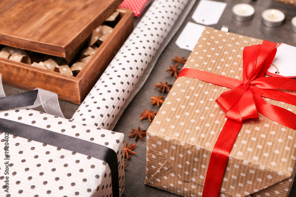 Composition with beautiful gift boxes on grey background