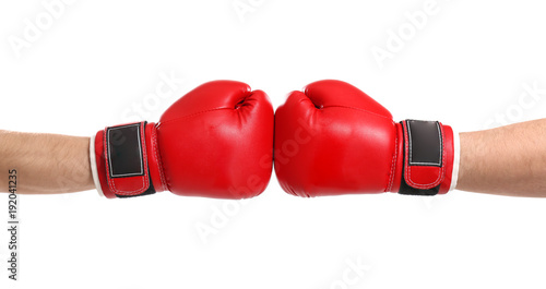 Men in boxing gloves on white background © Africa Studio