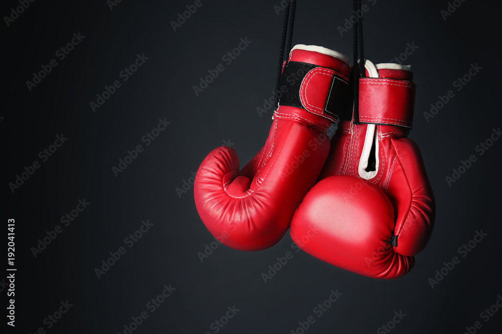 Boxing gloves on gray background