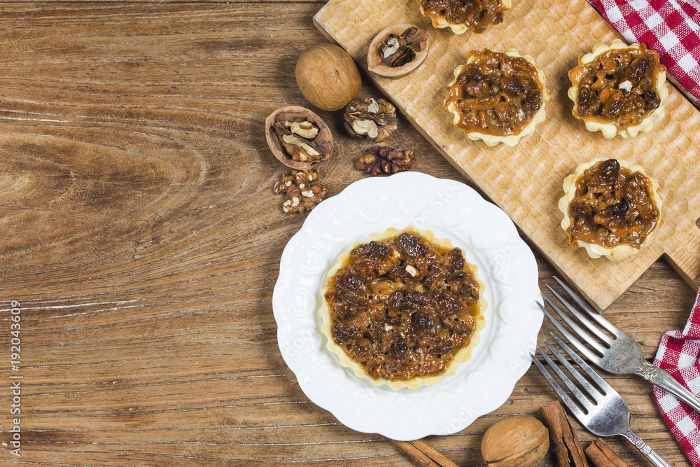 Fototapeta premium The walnut pie is on the table