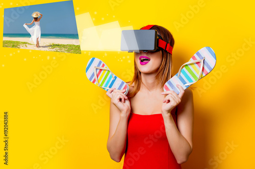 girl with virtual reality glasses dreaming about vacation